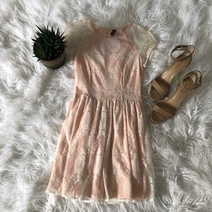 Lace, light pink, babydoll cut dress.